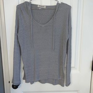Grey top with hood.